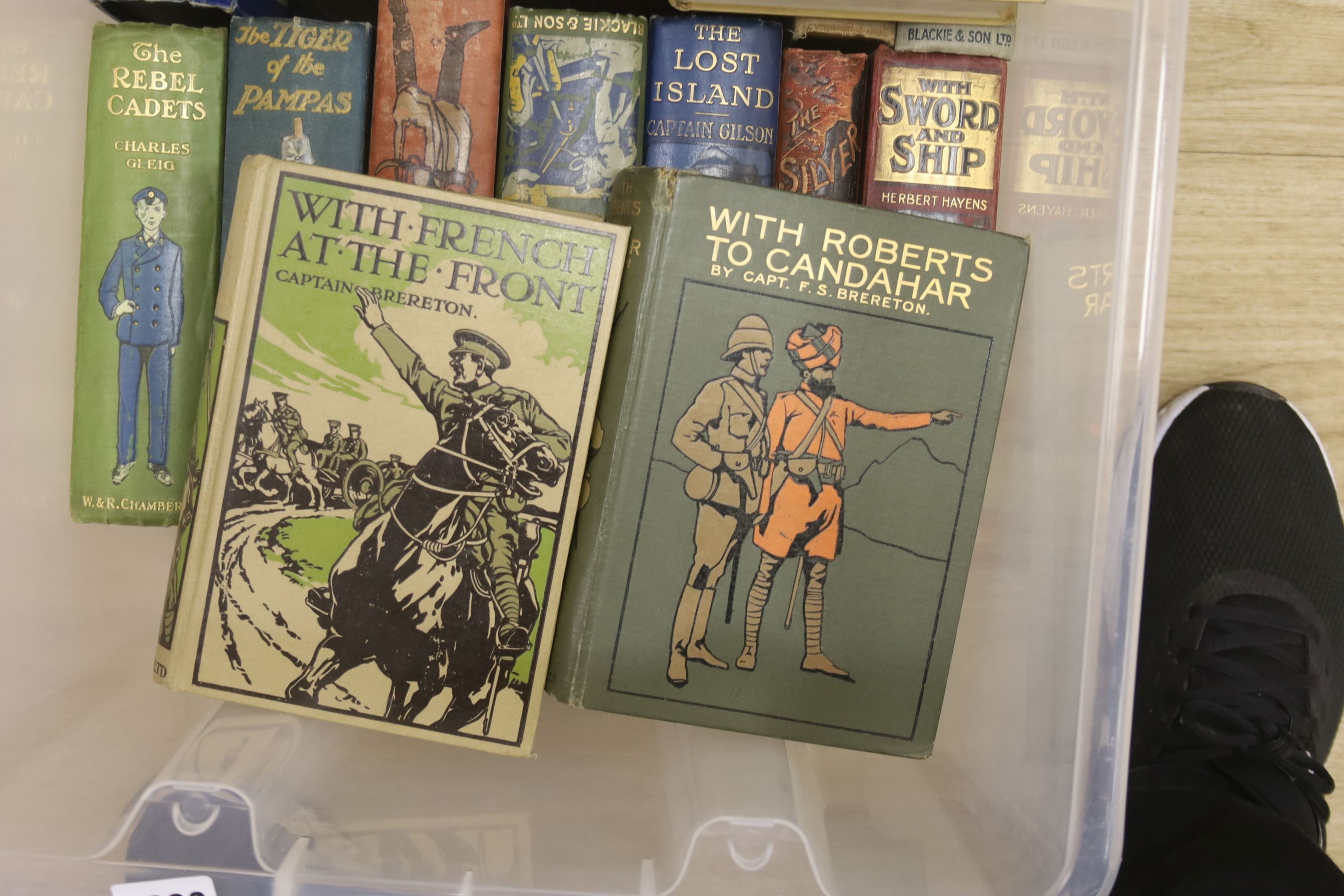 Twenty one early 20th century children's adventure novels, with pictorial covers, published by Blackie and Son Ltd, etc.